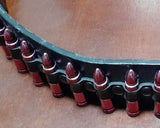 Ladies Black Fashion Bullet Belt With Pink Bullets. Size medium, good quality