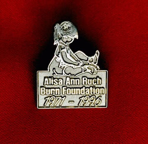 Authentic Alisa Ann Ruch Burn Foundation 1971-96 Silver Tone Pin Badge