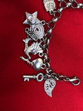 Vintage Silver Tone Charm Bracelet with 18 charms