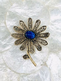 Vintage Signed ART Blue Stone Ornate Gold Tone Flower Brooch Pin