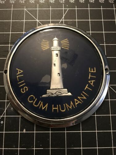 Aliis Cum Humanitate Car Badge