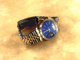 Stamper 10 atm Water Resistant Swiss Parts Face Gold Silver Tone Blue Face Watch
