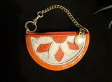 Authentic signature Coach coin purse/key chain. Orange Patten leather